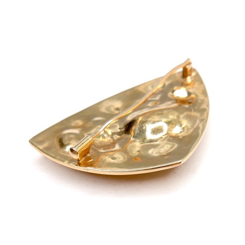 357 - An unmarked 18ct yellow gold brooch, of modernist triangular form, set randomly with jade, two rubie... 