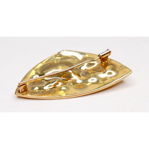 357 - An unmarked 18ct yellow gold brooch, of modernist triangular form, set randomly with jade, two rubie... 