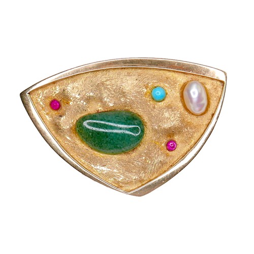 357 - An unmarked 18ct yellow gold brooch, of modernist triangular form, set randomly with jade, two rubie... 