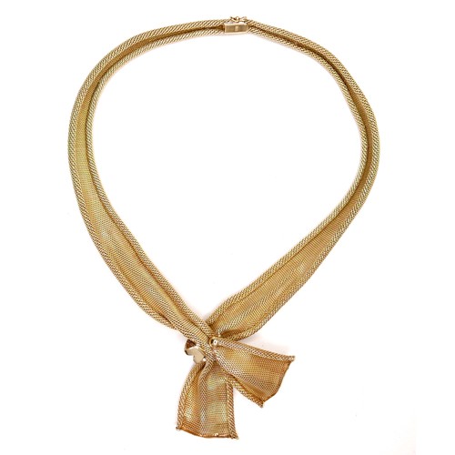 393 - A foreign 18ct yellow gold necklace, woven links set in the form of a scarf, with press clasp, stamp... 