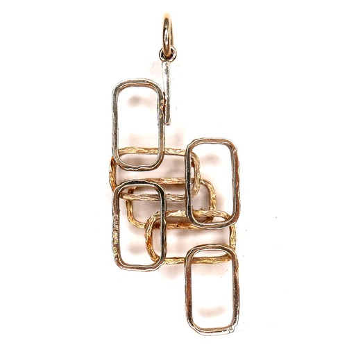 300 - A vintage 9ct gold pendant, of modern design formed of seven overlaid rectangles, CJL Ltd, London 19... 