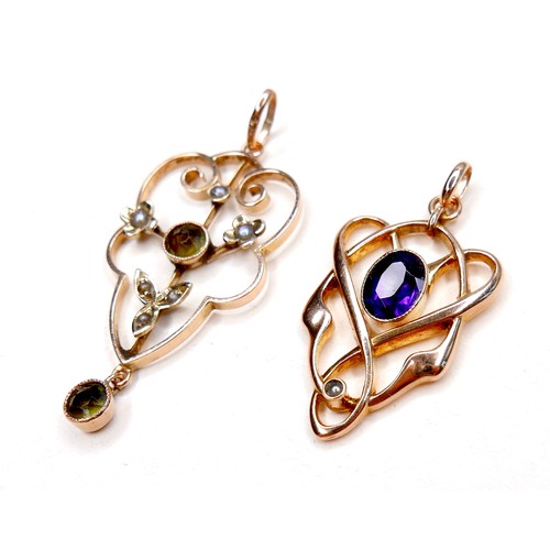 255 - An Art Nouveau 9ct amethyst and pearl pendant, together with another 9ct gold pendant set with green... 