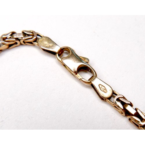 365 - A 9ct gold fancy link chain necklace, 28.7g, 81cm long.