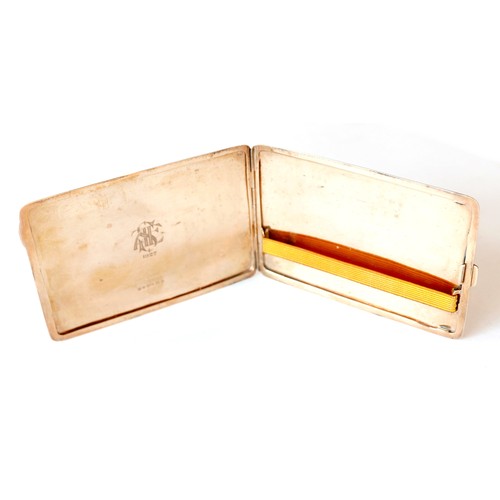 391 - A George VI 9ct gold cigarette case, decorated with a checkerboard design, pin hinge to one end with... 