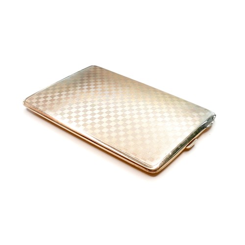 A George VI 9ct gold cigarette case, decorated with a checkerboard design, pin hinge to one end with sprung thumb clasp, engraved internally with 'S A E 1927' monogram, with gold coloured elasticated band opposite, elastic now perished, Charles S Green & Co Ltd, Birmingham 1925, 1.1 by 11.5 by 8.1cm, 121.9g gross.