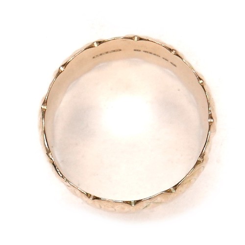 274 - A 9ct gold wide ring with scalloped edges and engraved design, size Q/R, 12mm wide, 7.4g.