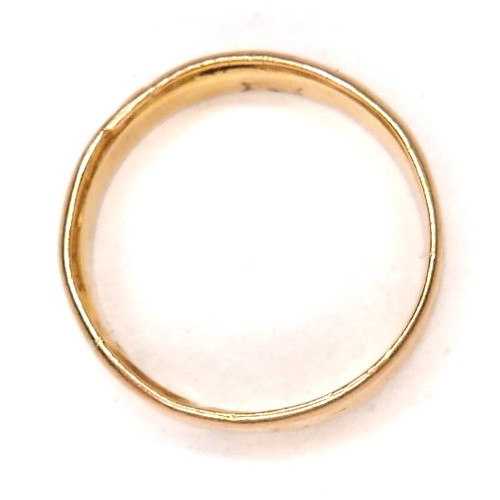 241 - A gold wedding band ring, formed from two separate thinner rings joined together, marks partially co... 