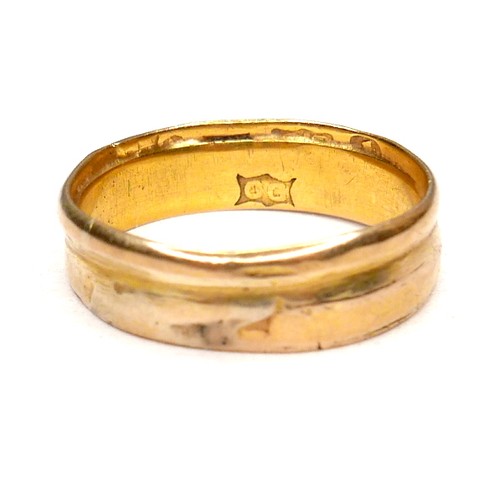 241 - A gold wedding band ring, formed from two separate thinner rings joined together, marks partially co... 