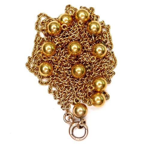 367 - An unmarked 18ct yellow gold guard chain necklace, formed of twelve spheres joined by lengths of cha... 