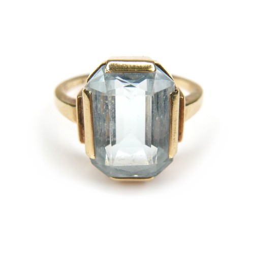 269 - A 14ct gold Aquamarine style stone ring, the emerald cut stone 13 by 10mm, the band stamped 585, L/M... 