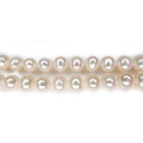 270 - A single strand pearl necklace with 14ct gold clasp, the evenly sized pearls each approximately 6mm ... 