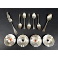 A small group of silver items, comprising four dishes with whist suits, 7.2cm, six teaspoons, and a ... 