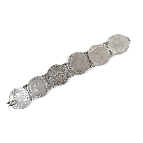 244A - A silver coin bracelet, formed of six 16th century Elizabeth I / Charles II silver coins, together w... 