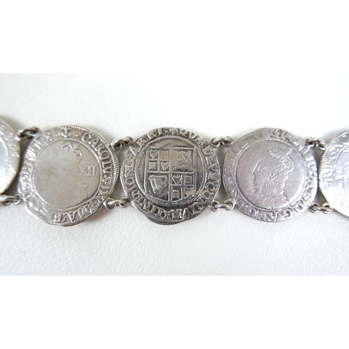 244A - A silver coin bracelet, formed of six 16th century Elizabeth I / Charles II silver coins, together w... 