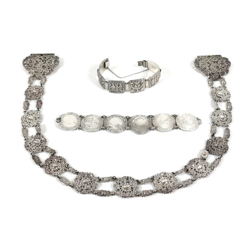 244A - A silver coin bracelet, formed of six 16th century Elizabeth I / Charles II silver coins, together w... 