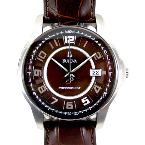 214 - A Bulova Precisionist stainless steel gentleman's wristwatch, in 1950's style, circular mahogany bro... 