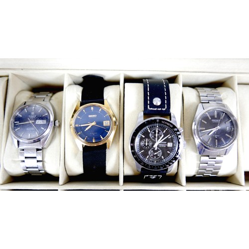 203 - A collection of fifteen modern wristwatches, comprising a Tissot Automatic Seastar, two Seiko, a Cit... 