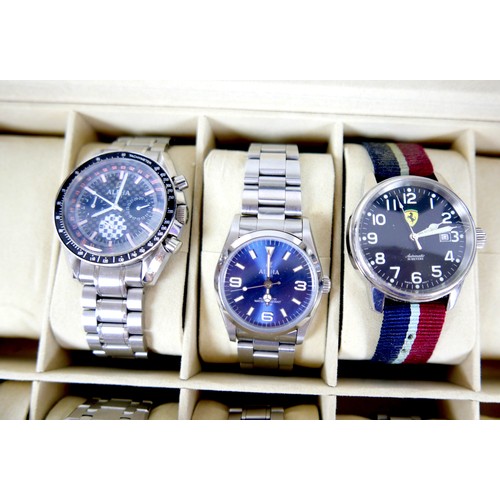 203 - A collection of fifteen modern wristwatches, comprising a Tissot Automatic Seastar, two Seiko, a Cit... 