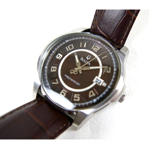 214 - A Bulova Precisionist stainless steel gentleman's wristwatch, in 1950's style, circular mahogany bro... 