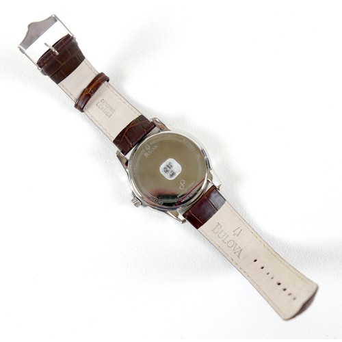 214 - A Bulova Precisionist stainless steel gentleman's wristwatch, in 1950's style, circular mahogany bro... 