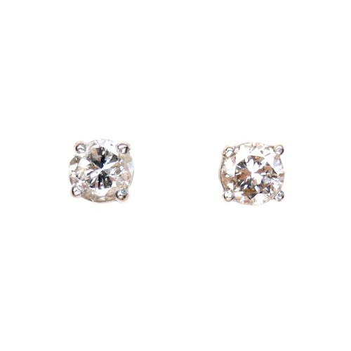 377 - A pair of diamond solitaire stud earrings, , each brilliant cut stone 4.9 by 3.4mm, 0.5ct, on 18ct w... 