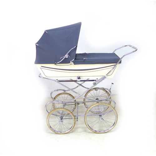 64 - A vintage Marmet coach built pram, with blue hood/apron and attachable sun canopy, blue floral inter... 