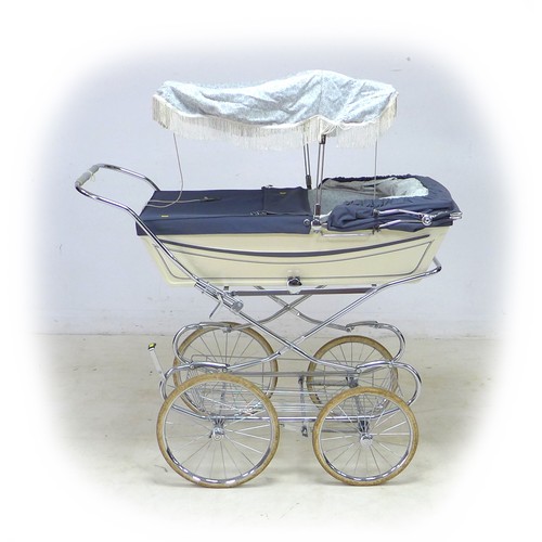 64 - A vintage Marmet coach built pram, with blue hood/apron and attachable sun canopy, blue floral inter... 