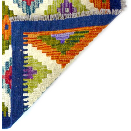 146 - A Chobi Kilim runner, decorated with diamond pattern with six and a half diamonds through centre, ea... 