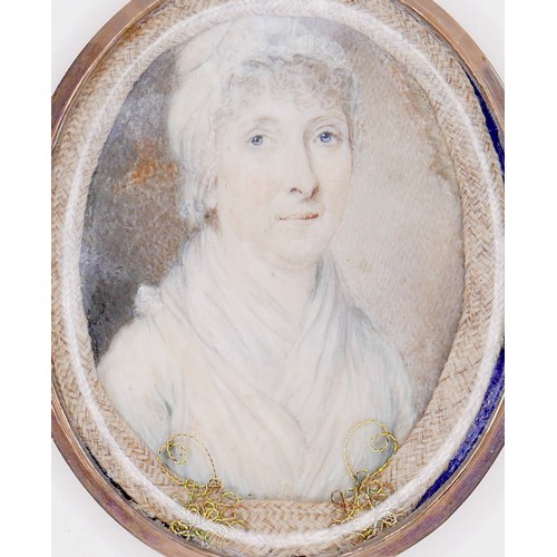 104 - A large early 19th century gold framed portrait miniature, depicting a lady in a white dress and bon... 