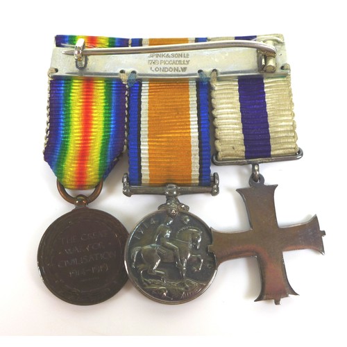 90 - A group of WWI medals, with gallantry award, comprising The Military Cross, King George V GRI cypher... 