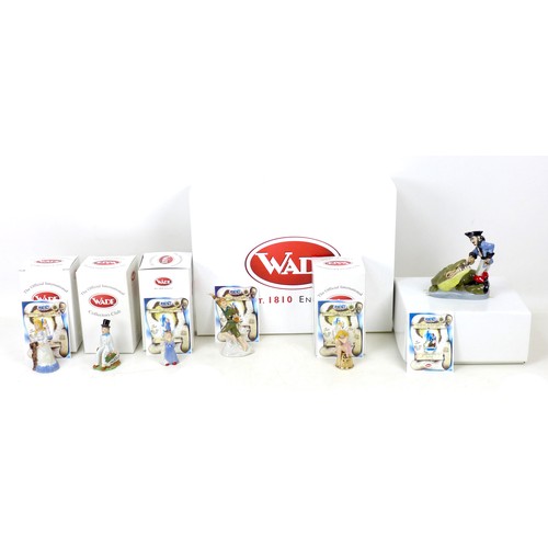 14 - A large collection of Wade figurines and ornaments, including six Wade boxed Peter Pan Collection fi... 