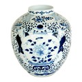A Chinese porcelain ginger vase, circa 1900, decorated in underglaze blue with a depiction of two la... 