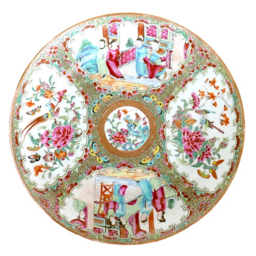1 - A Canton porcelain dish, late 19th century, typically decorated with four panels, 3.2 by 24.7cm.