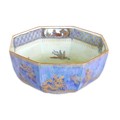 A Wedgwood pottery bowl, octagonal form, lustre glaze with dragons, birds, and buildings, pattern nu... 
