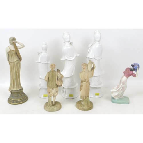36 - A group of ceramic figurines, a pair of Royal Worcester blush ivory, model 1206, modelled as a man a... 