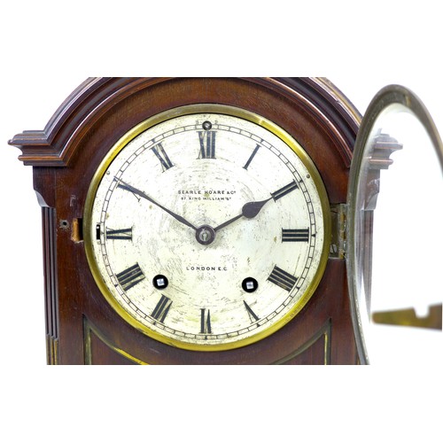 94 - An Edwardian mantel clock, signed 'Searle Hoare & Co, London', silvered dial with Roman numerals, do... 