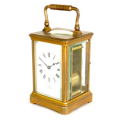 96 - A French 19th century repeating brass carriage clock, retailed by Dent, London, with white enamel di... 