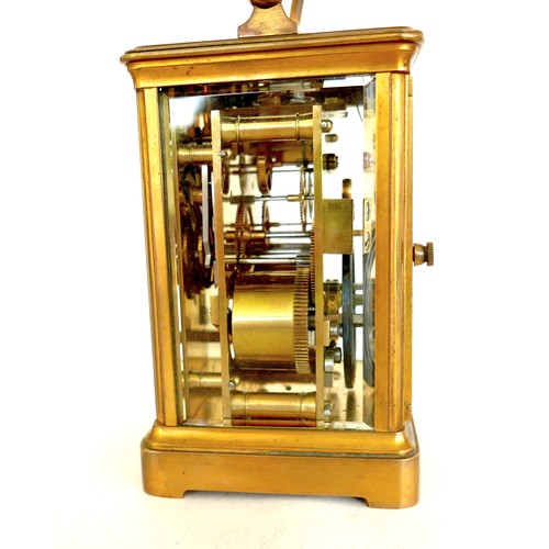 96 - A French 19th century repeating brass carriage clock, retailed by Dent, London, with white enamel di... 