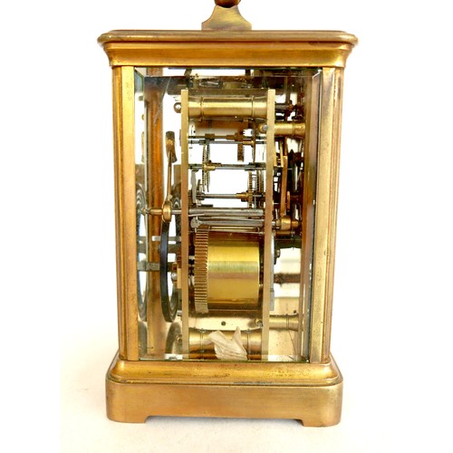 96 - A French 19th century repeating brass carriage clock, retailed by Dent, London, with white enamel di... 