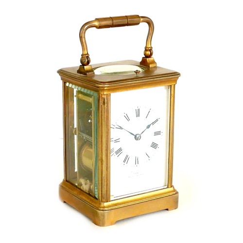 96 - A French 19th century repeating brass carriage clock, retailed by Dent, London, with white enamel di... 