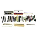 A collection of fountain pens and propelling pencils, mostly damaged, including four fountain pens w... 