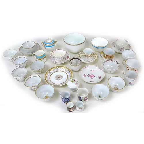 19 - A collection of unmarked teacups, saucers and other ceramics, including a teacup potentially by Newh... 