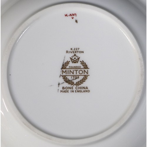 35 - A Minton china part dinner service, decorated in the Riverton pattern, comprising eleven dinner plat... 