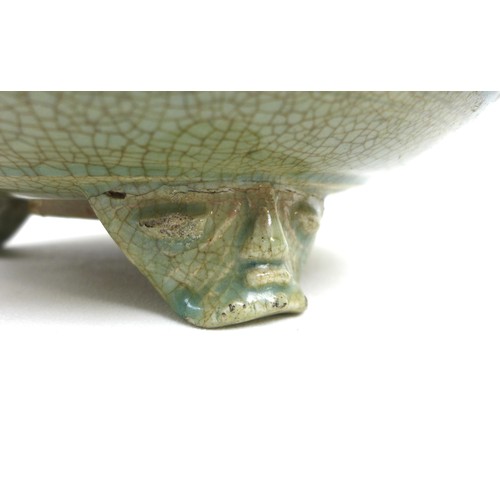 10 - A Chinese 'Longquan' celadon tripod censer, possibly Ming, crackled green glaze running to an uneven... 