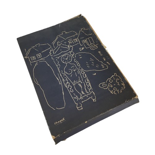 83 - A signed limited edition 'Le dur Desir de Durer' by Marc Chagall and Paul Eluard, with twenty-six il... 