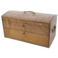 An early 19th century mahogany table top chest, the gently domed hinged lid with brass swan neck han... 