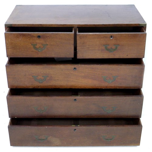 198 - An early Victorian mahogany campaign chest of two short over three long drawers, flush campaign bras... 