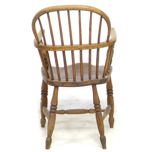 175 - An 18th century elm and oak low back Windsor open arm chair, with H stretcher and turned legs, 52.5 ... 