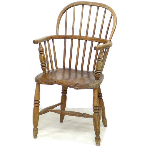 175 - An 18th century elm and oak low back Windsor open arm chair, with H stretcher and turned legs, 52.5 ... 