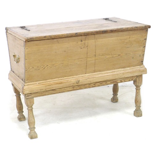 183 - A small 18th century pine dough bin, with brass carry handles, and on a later stand with turned legs... 